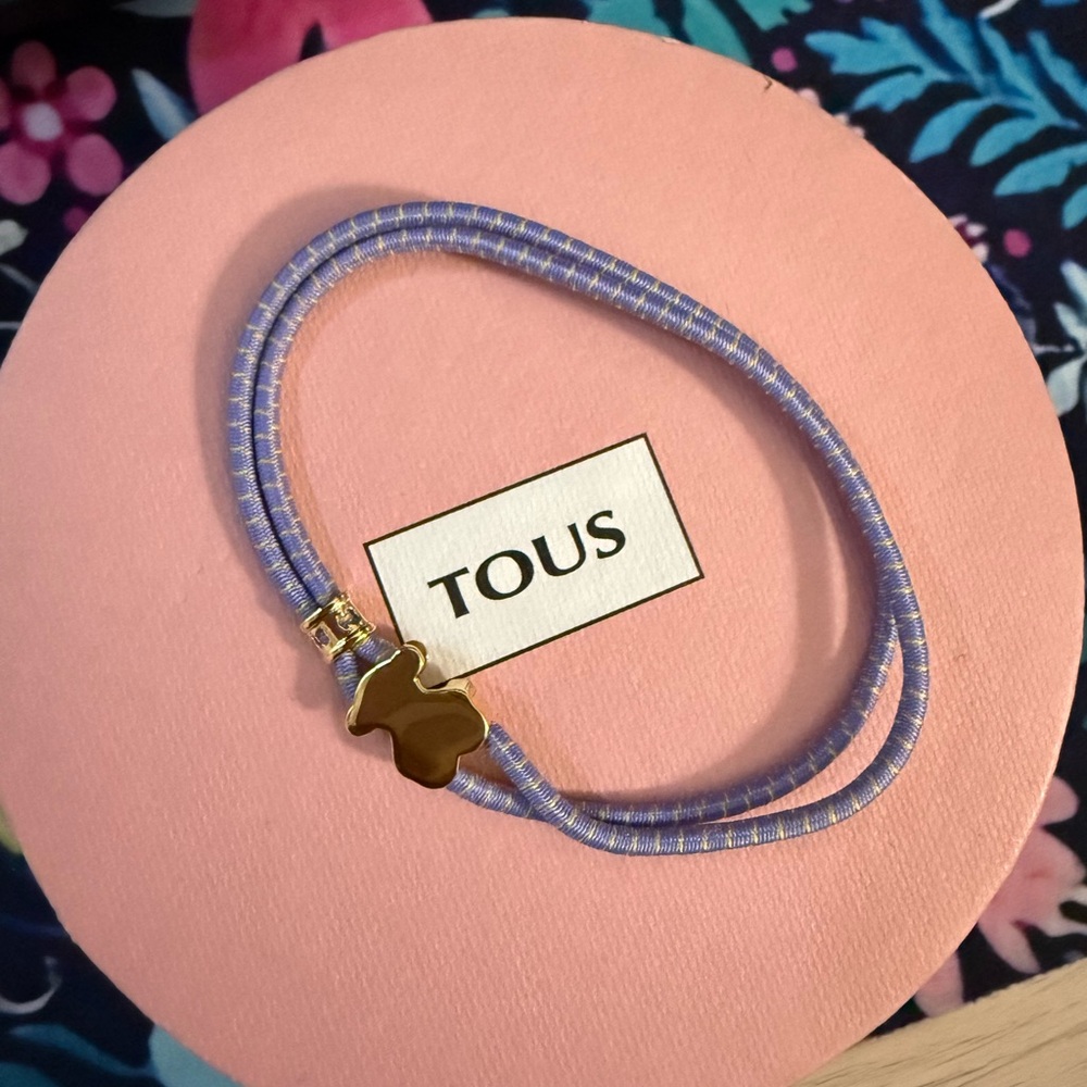 Tous blue with 18k gold plating over silver elastic bracelet
